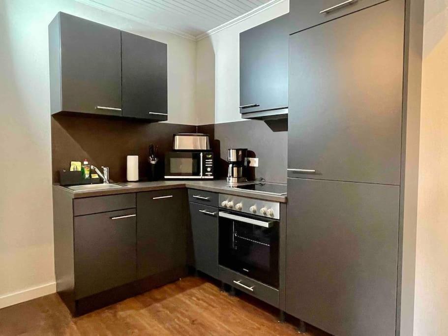 Studioappartement Mit Privatgarten In Ruhiger Wohnsiedlung ノイミュンスター エクステリア 写真